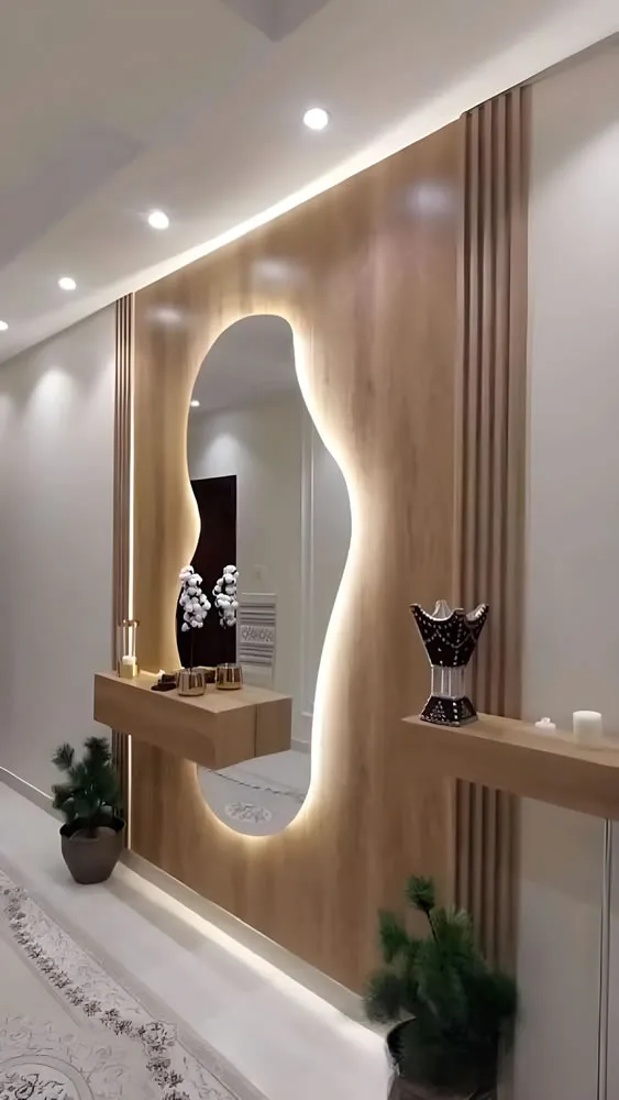hall-de-Entrada-com-painel-ripado-de-madeira-aparador-flutuante-e-espelho-organico-com-led-2